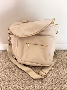 Fawn Design Cream Crossbody Diaper Bag with Gold Hardware